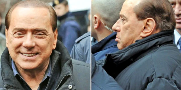 Silvio Berlusconi îmbrăcat în geaca primită în dar de la premierul rus Vladimir Putin