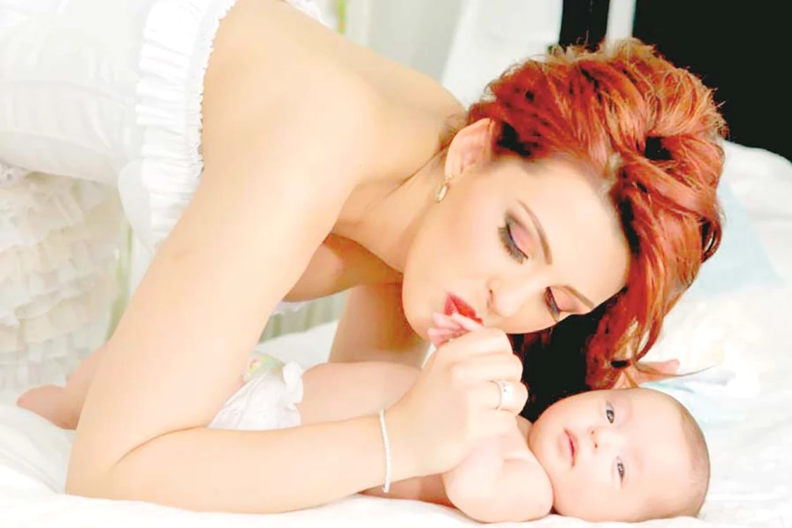 Elena Gheorghe,  cu soţul ei, Cornel,  şi cu fiul lor, Nicholas