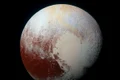 Primele fotografii din istorie cu planeta pitică Pluto jpeg