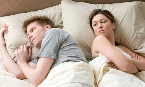 hostile couple in bed jpeg