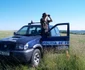 Un poliţist de frontieră a intrat în flăcări pentru a salva o domnişoară de 20 de ani 