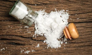 salt sprinkled on wooden table jpeg