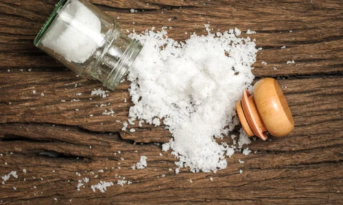 salt sprinkled on wooden table jpeg