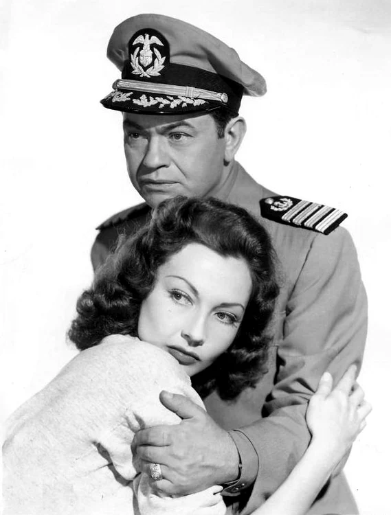 Lynn Bari și Edward G. Robinson, în filmul „Tampico” (© Wikimedia Commons)