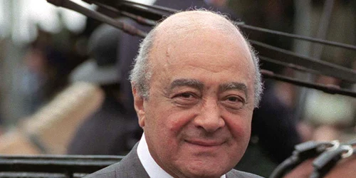 Miliardarul Mohamed Al Fayed împreună cu Regina Elisabeta a II a foto GettyImages jpg