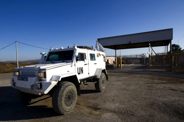 Specialiştii ONU călătoresc cu un convoi de 13 maşini oficiale. FOTO: Reuters