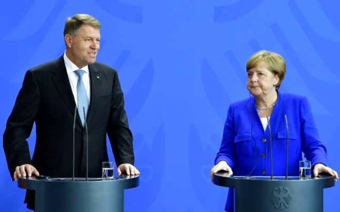 Preşedintele Klaus Iohannis şi cancelarul german Angela Merkel. FOTO AFP