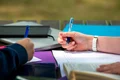 college students cramming outdoor jpg