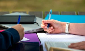 college students cramming outdoor jpg
