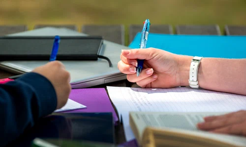 college students cramming outdoor jpg
