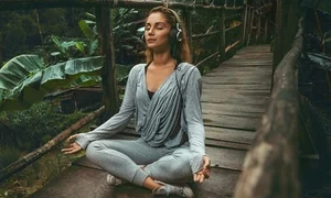 woman listening to relaxing music jpeg