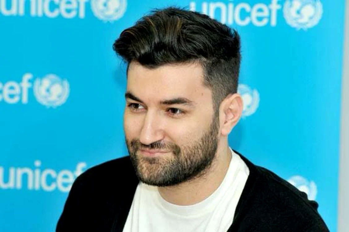 Smiley este încântat că îi va creștina băiețelul lui Velea FOTO: Arhiva personală