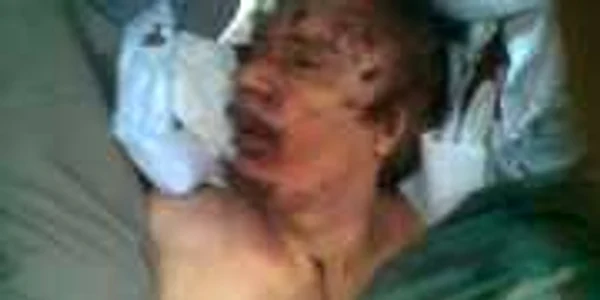 Imagini surprinse imediat după ce Muammar Gaddafi a fost ucis