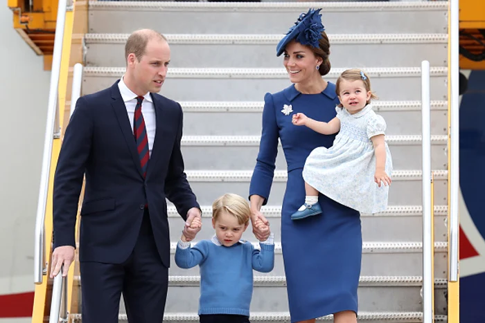 
    Kate Middleton a purtat o rochie mai puțin specifică stadardelor Familiei Regale britaniceFoto Getty  