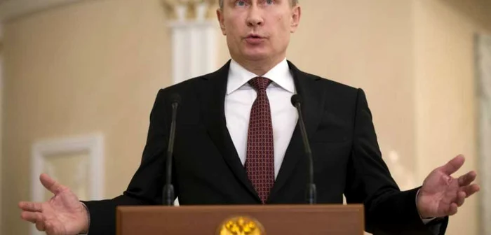 Vladimir Putin, la semnarea Acordului de la Minsk (12 februarie 2015)  FOTO AP