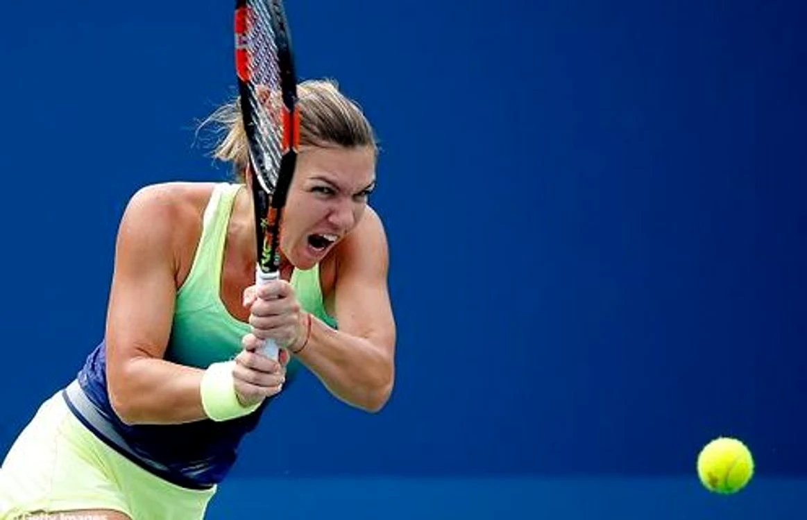 
    Andrea Petkovic a cedat după trei seturi în faţa Simonei HalepFoto Twitter/WTA  