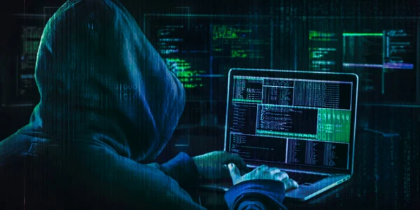 Hacker laptop hacking FOTO Shutterstock