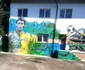 Portretul marelui Nicolae Dobrin pe un hotel din Horezu - Vâlcea autor - Adrian Luţă Foto Arhiva personală