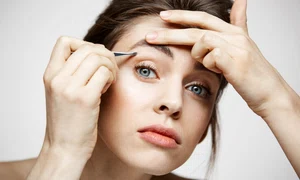 young beautiful woman with perfect clean skin tweeze eyebrows facial treatment jpg