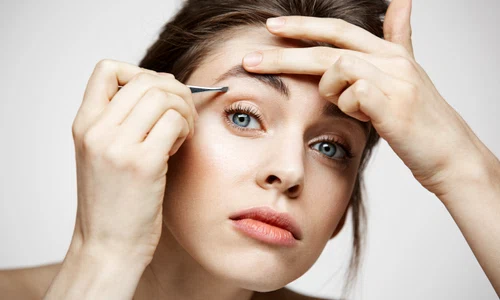 young beautiful woman with perfect clean skin tweeze eyebrows facial treatment jpg