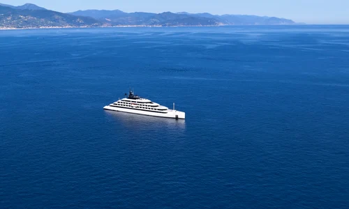 aerial view luxury superyacht cruising italian riviera coastline jpg