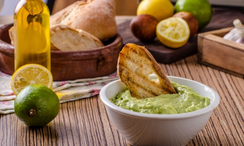 50760515   avocado basil pesto with fresh garlic toast and olive oil jpeg
