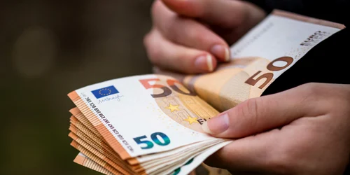closeup female hands counting euro banknotes world money inflation economy concept jpg