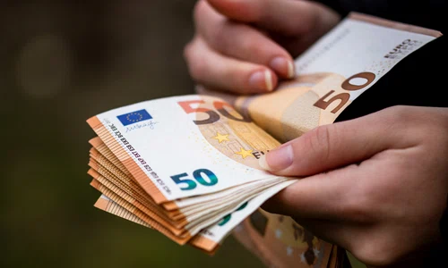 closeup female hands counting euro banknotes world money inflation economy concept jpg