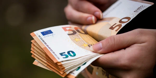 closeup female hands counting euro banknotes world money inflation economy concept jpg