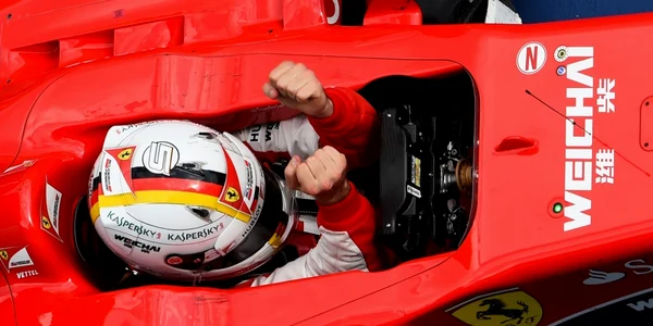Germanul Sebastian Vettel de la echipa Ferrari se bucură după ce a câştigat Marele Premiu de Formula 1 al Maleziei pe circuitul Sepang în Kuala Lumpur Malaezia FOTO Guliver/Getty Images