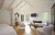 Liam Hemsworth's house cost $ 6 8 million It is a ranch style house 1950s Front is all window It has hardwood floors Apparently it has both window, but it's all super technologized, as the windows are handled easily by remote control jpeg