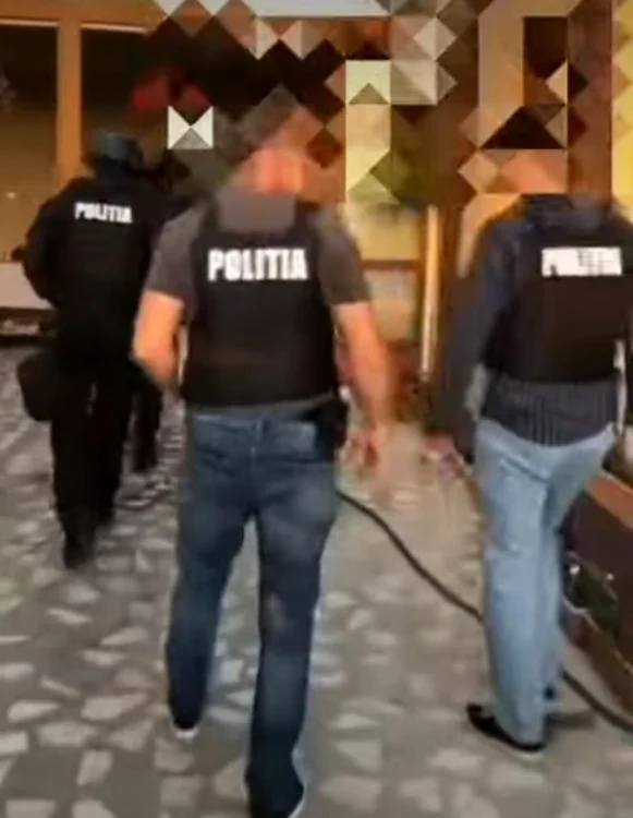 Imagine din timpul percheziţiilor efectuate la Ploieşti, captură video