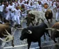 tauri prin multimea de alergatori la san fermin pamplona foto reuters 8