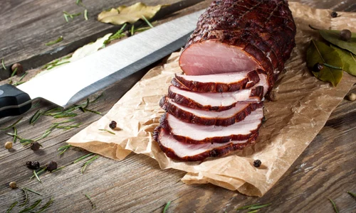 38669212   smoked ham on a chopping board  jpeg