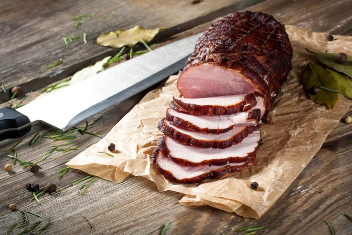 38669212 smoked ham on a chopping board jpeg
