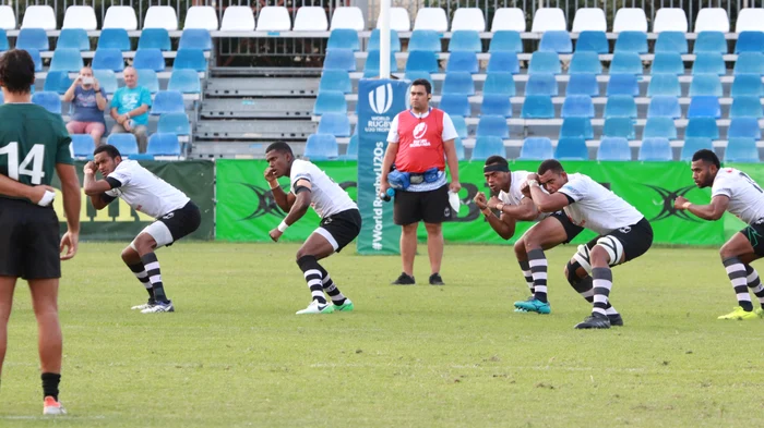 
    Echipa Fiji execută dansul înaintea meciului cu PortugaliaFoto: Marian Burlacu  