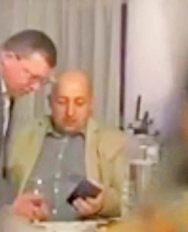 Comisarul-şef Gheorghe Irimescu, lângă George Tărâţă, zis “Cuşu”