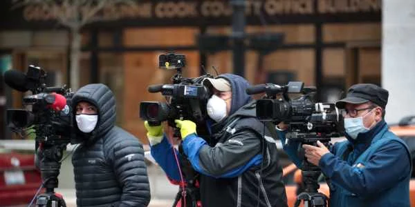 Jurnalisti cu masca in SUA FOTO AFP 