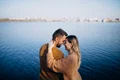 young couple park standing by river jpg