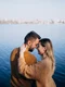 young couple park standing by river jpg