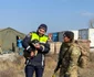 Patru căței au fost salvați de un soldat britanic în timpul unui exercițiu militar la Smârdan. FOTO: IPJ Galați