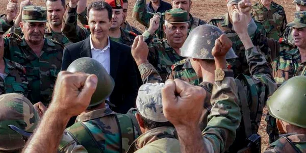 Preşedintele sirian Bashar al Assad vizitează o bază militară din oraşul Habit din provincia Idlib Siria FOTO Profimedia
