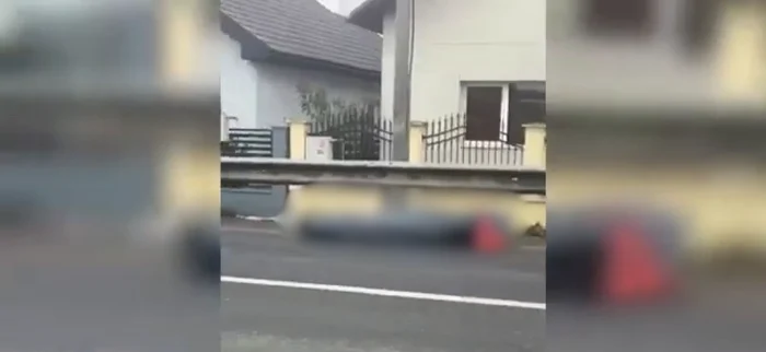 Cadavrul căzut din mașina furerară/FOTO: Baia MareTV