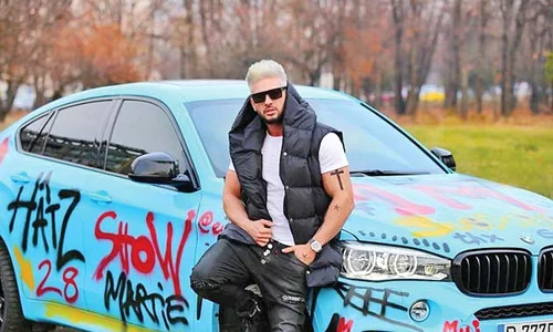 Dorian Popa are  BMW X 6, de  80 000 de euro  jpeg