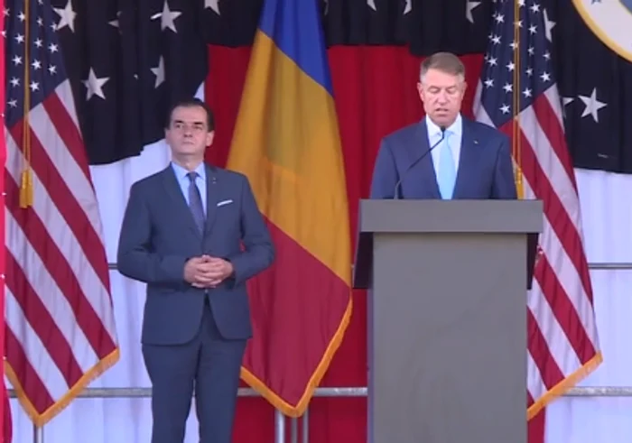 Klaus Iohannis și Ludovic Orban, la recepția oferită de Ambasada SUA cu ocazia Zilei IndependențeiFoto: Captură Video