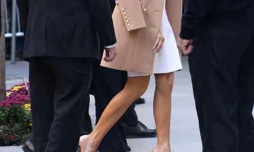 Donald Trump arrives with wife Melania Trump to vote at the polls as he holds her hand and touches her back gently as they arrive with Ivanka and family on Election Day in NYC jpeg