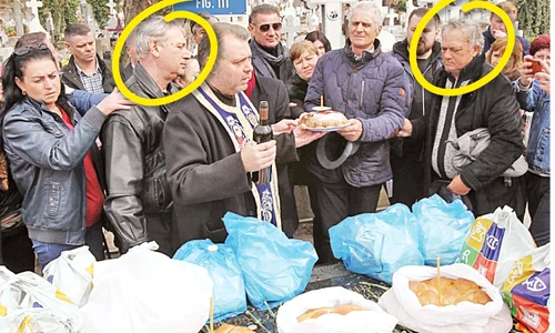 Cei doi fraţi ai lui Ion Dolănescu, la slujba din cimitir jpeg