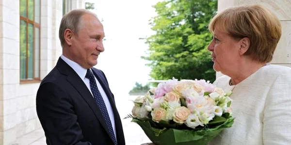 Putin - Merkel - flori