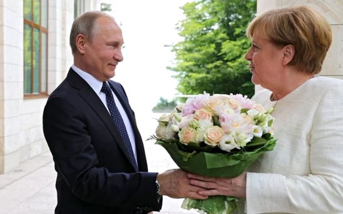 Vladimir Putin si Angela Merkel  - sursa foto - caleaeuropeana.ro