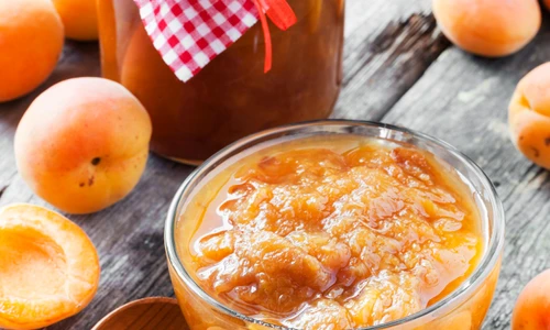 apricot fruits and jar of jam on table jpeg